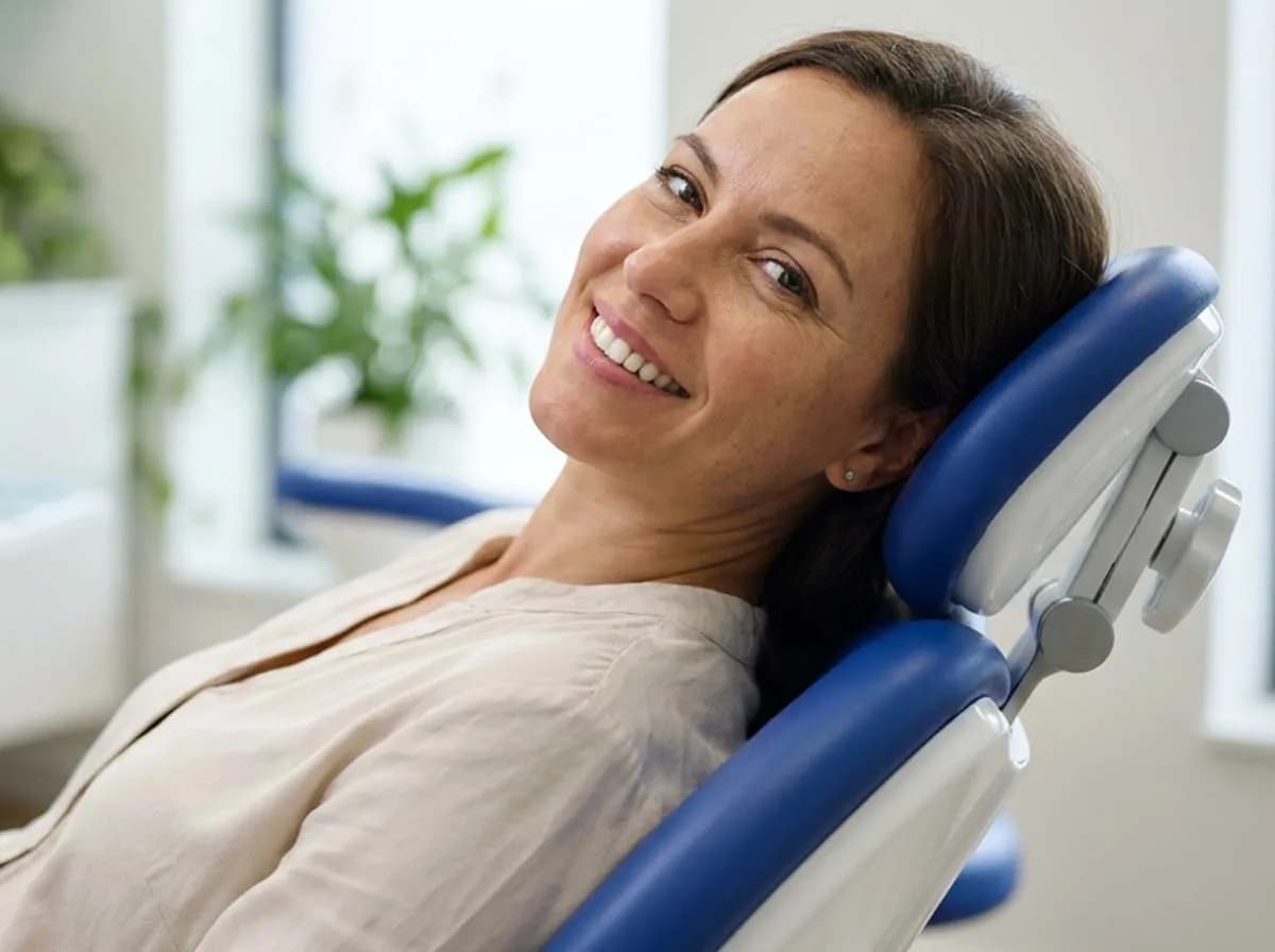Dental implant and crown held by a dentist