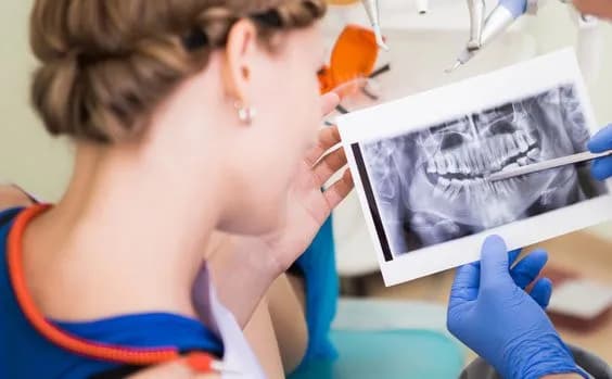 Patient receiving a comprehensive dental examination