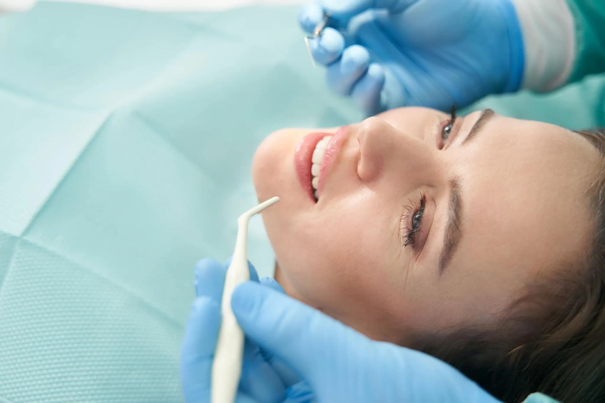 Dental team providing gentle treatment in modern surgery